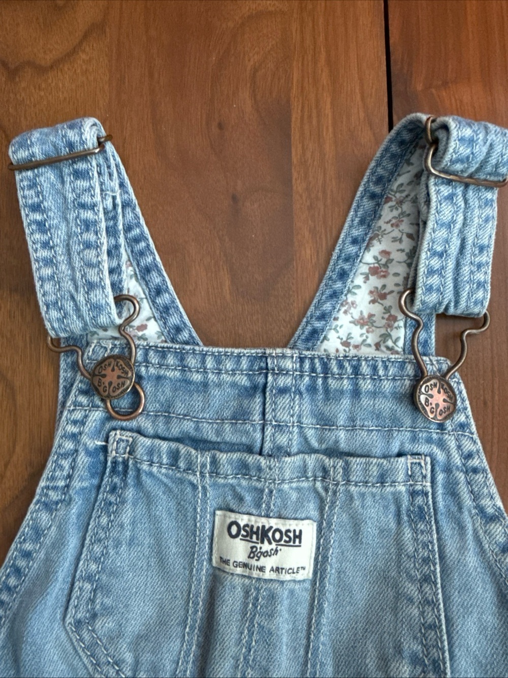 OshKosh B'gosh girls  Light Blue Denim Overalls with Floral Strap Lining 2T